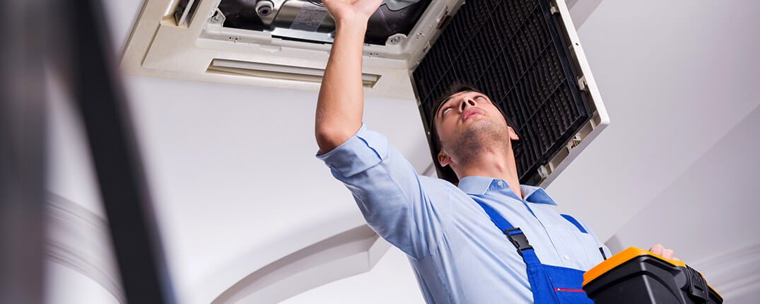 DunRite Heating & Air Inc. - repairing ceiling air conditioning unit